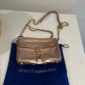 Women’s rose gold with gold accents crossbody